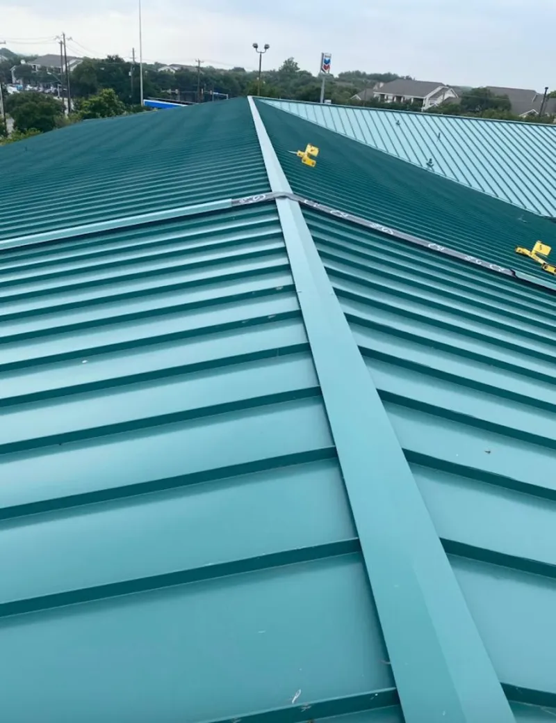 Green commercial metal roof ridge and valley for Metal Roof Repair in Duanesburg